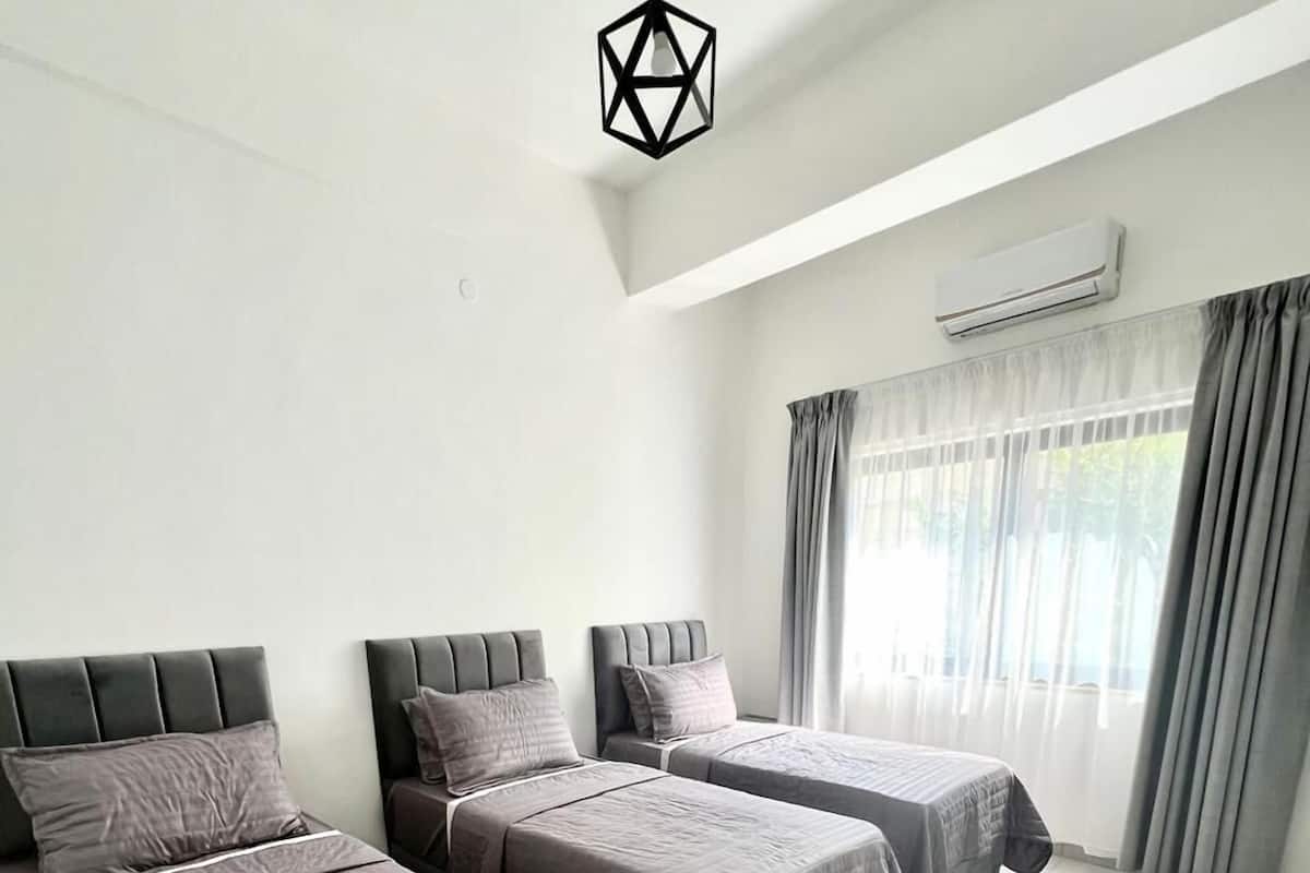 Habitación triple, baño privado | Wifi gratis