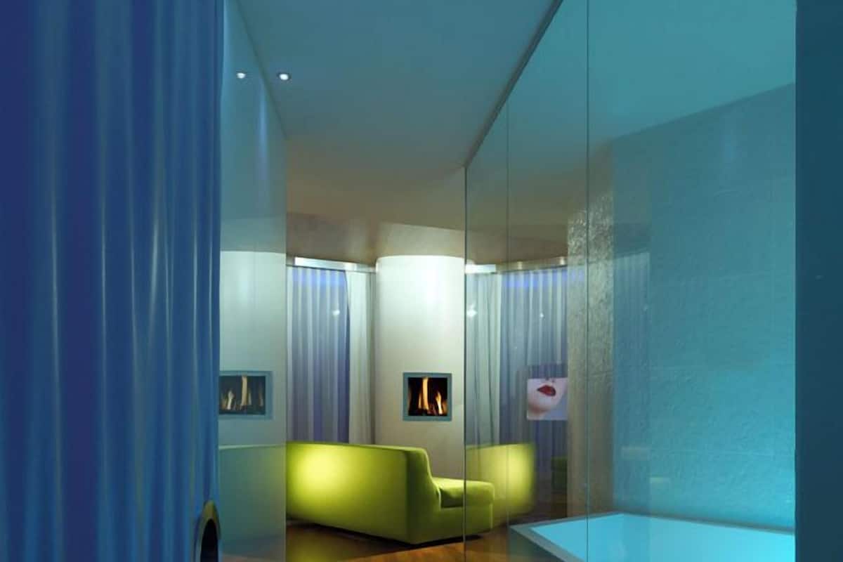 Suite Dolce Vista Quadrupla con Vista Mare (accesso spa non incluso) | Minibar, caja de seguridad en la habitación y insonorización