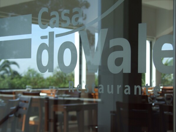 A restaurant sign with the name "Casa doVale" and the word "restaurant" visible. - Casa Do Vale Hotel (Évora)
