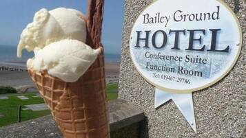 A sign for Bailey Ground Hotel, indicating a Conference Suite Function Room with a contact number.