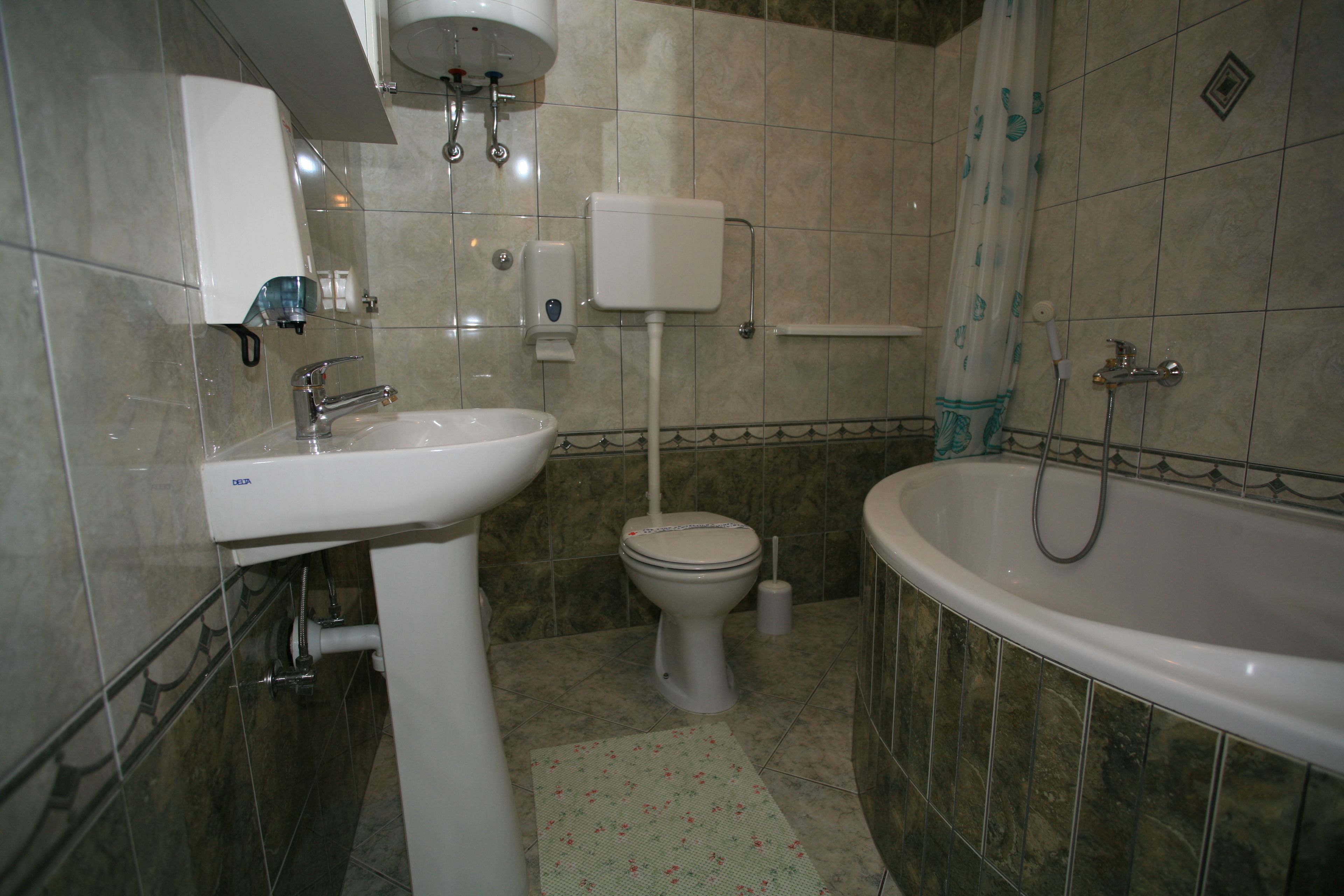 Apartment, 2 Bedrooms, Balcony | Bathroom | Bathtub, deep soaking tub, free toiletries, hair dryer