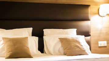 Ropa de cama de alta calidad, minibar y escritorio