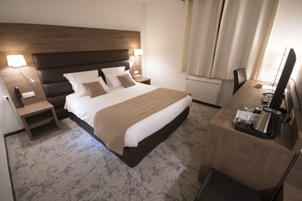 Chambre double | Literie de qualité, minibar, bureau, système d’insonorisation
