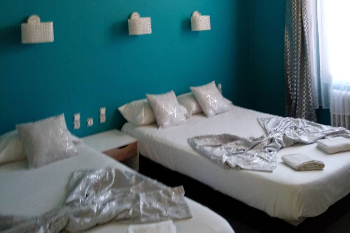 Quadruple Room, Private Bathroom | Premium bedding, desk, blackout drapes, iron/ironing board (on request)
