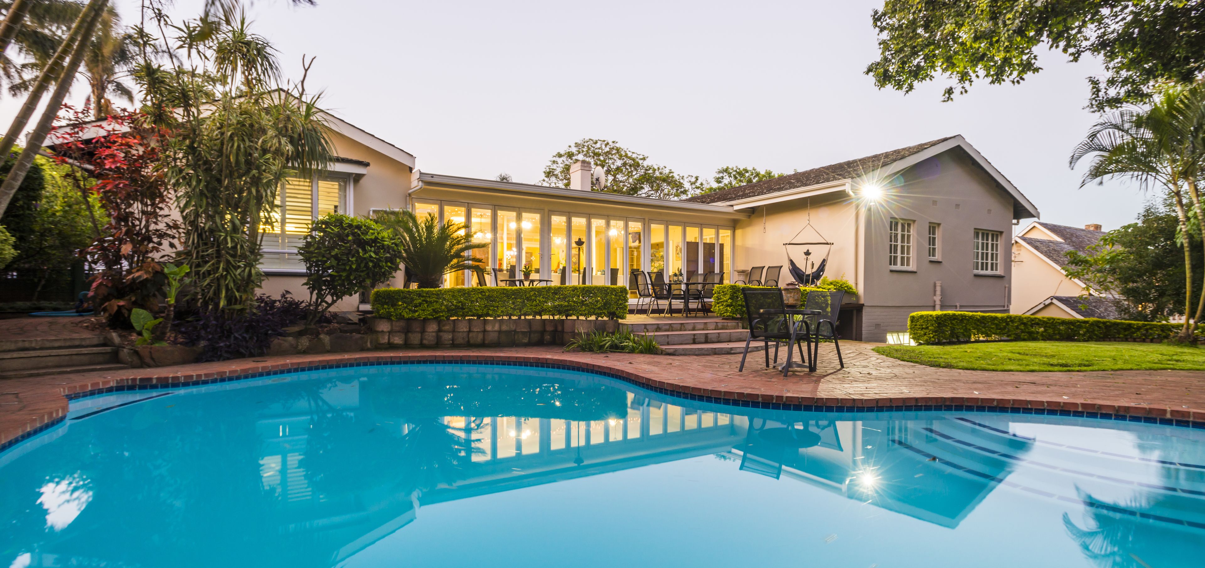 Outdoor pool, pool umbrellas, sun loungers