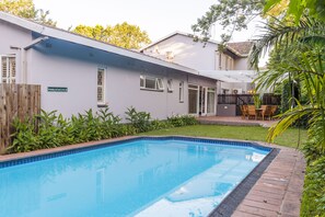 Outdoor pool, pool umbrellas, pool loungers