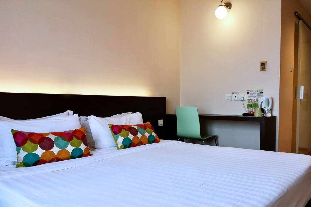 standard city view | 1 bedroom, down duvets, desk, laptop workspace