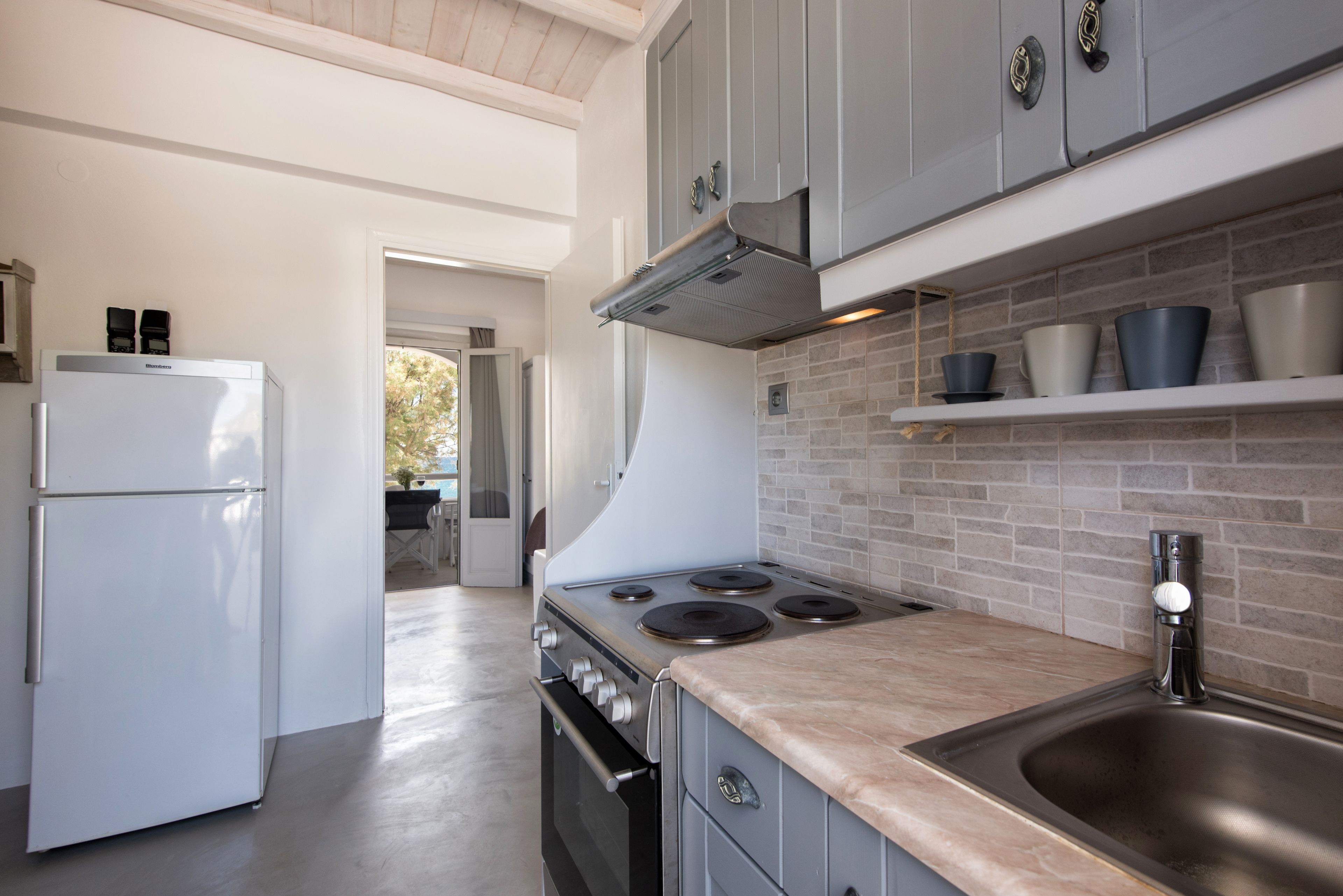 apartment, 2 bedrooms, sea view | private kitchenette | fridge, oven, stovetop, espresso maker