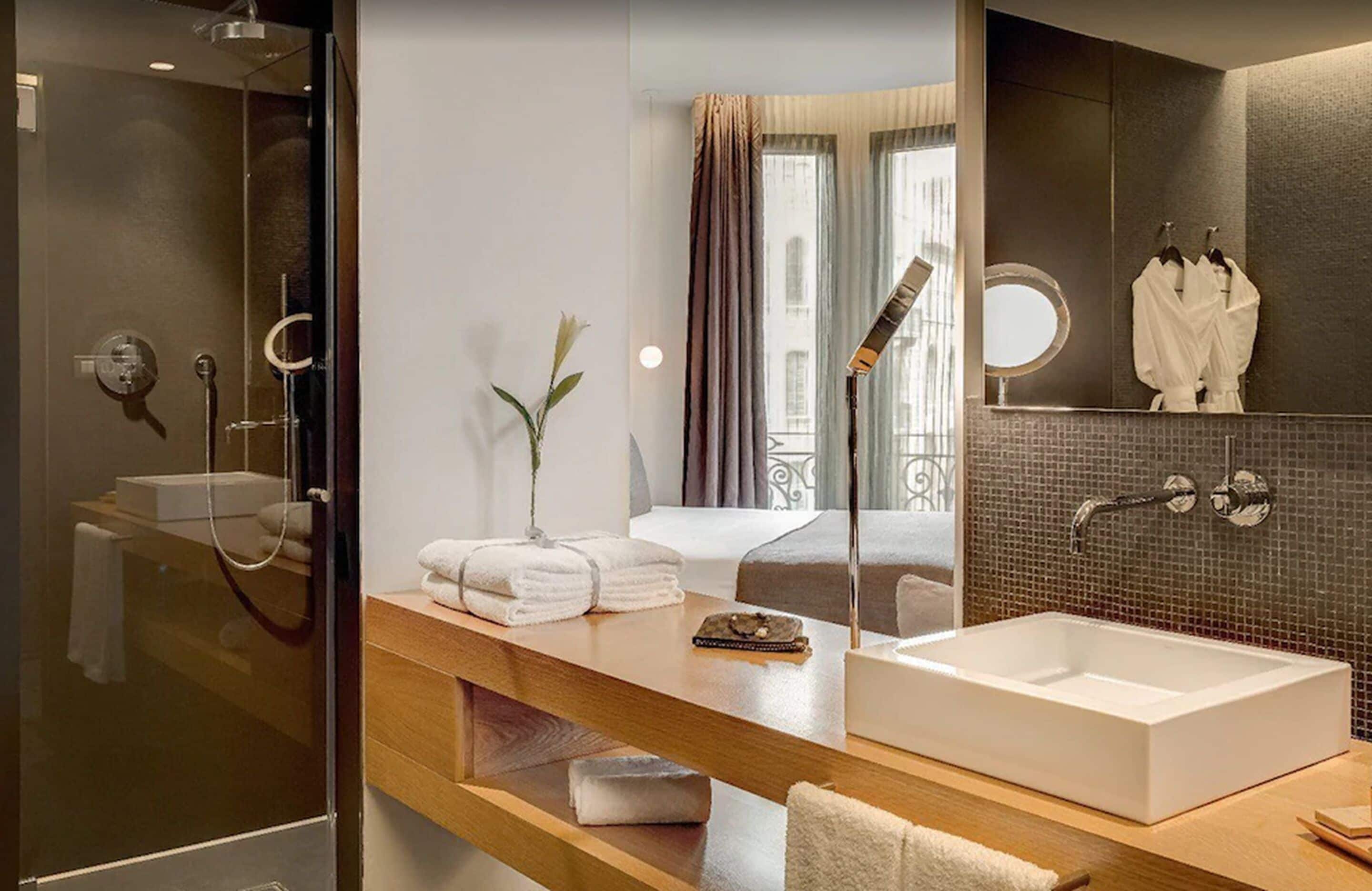 junior suite | bathroom | designer toiletries, hair dryer, bathrobes, slippers