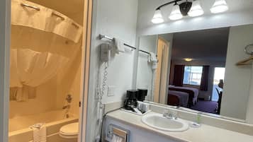 Combined shower/tub, deep soaking tub, hair dryer, towels