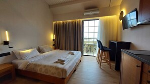 Dúplex, balcón | Ropa de cama de alta calidad, caja fuerte, sistema de insonorización