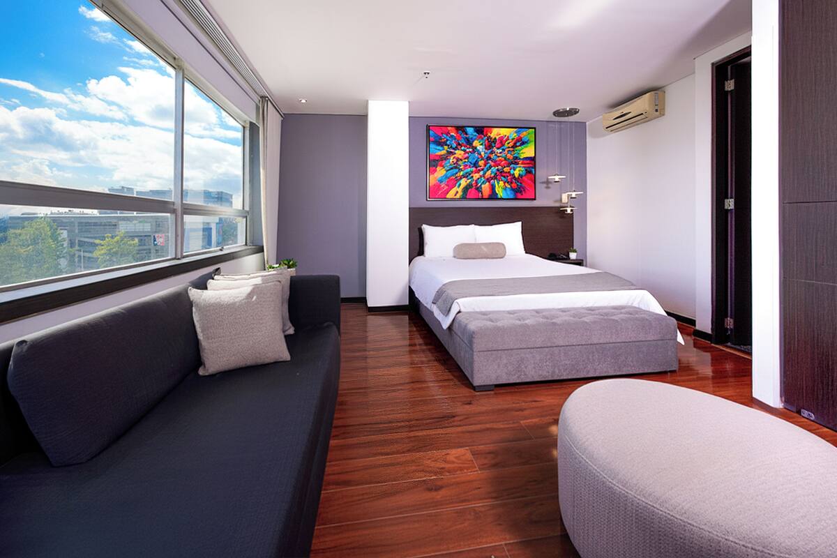 Junior Studio Suite | Hypo-allergenic bedding, down duvets, memory-foam beds, minibar