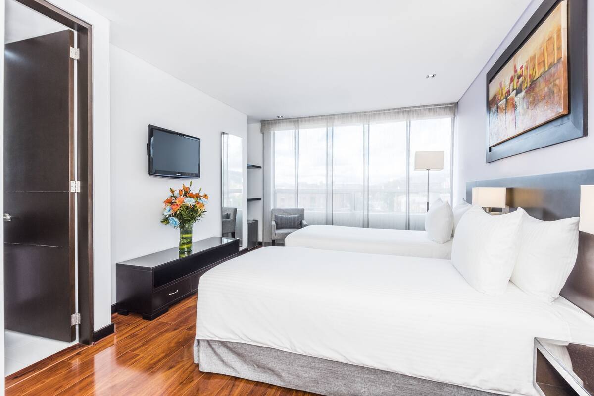 Hypo-allergenic bedding, down duvets, memory-foam beds, minibar