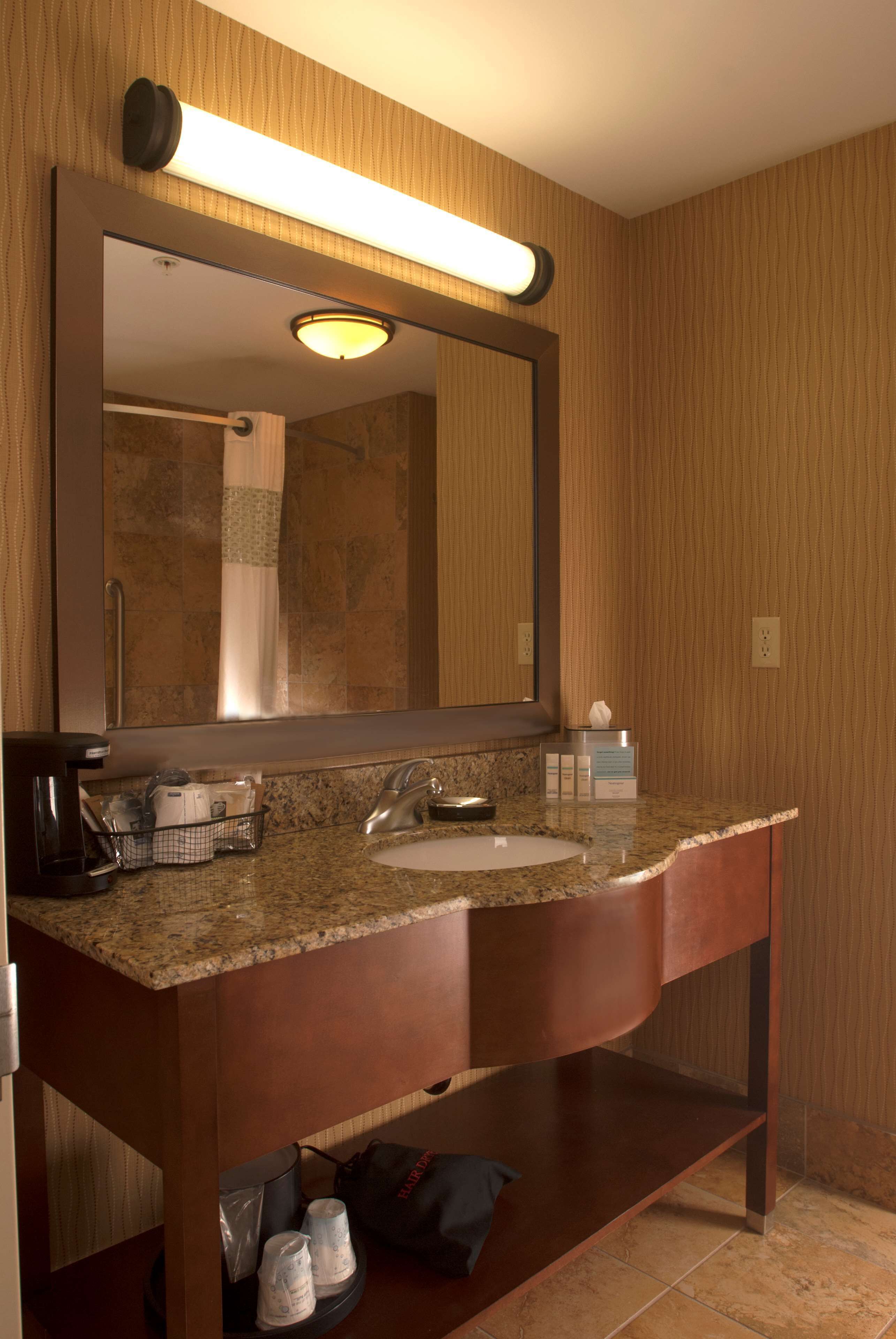 bathtub, hair dryer, towels