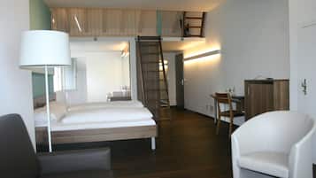 Allergitestade sängkläder, duntäcken och värdeförvaringsskåp på rummet