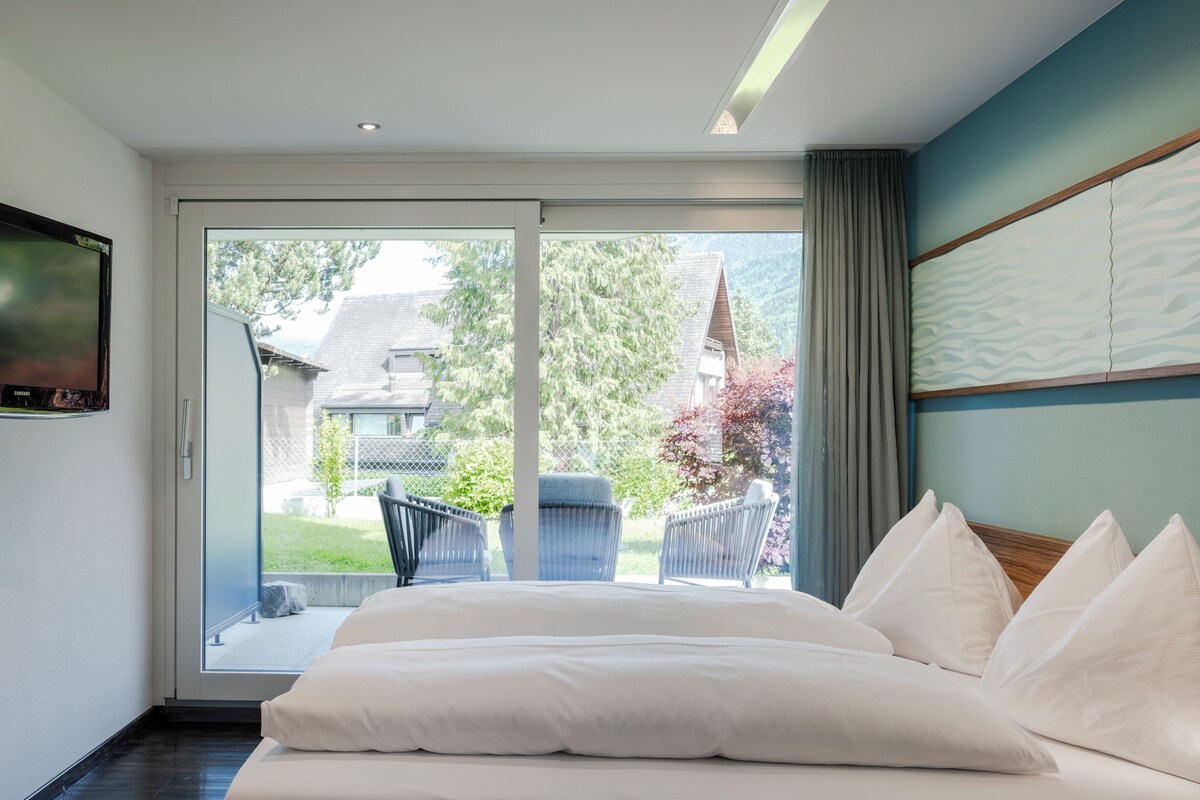 Familienzimmer mit zwei Schlafzimmer und Dorfblick | 低刺激性寝具、羽毛の掛け布団、ミニバー、セーフティボックス (室内)