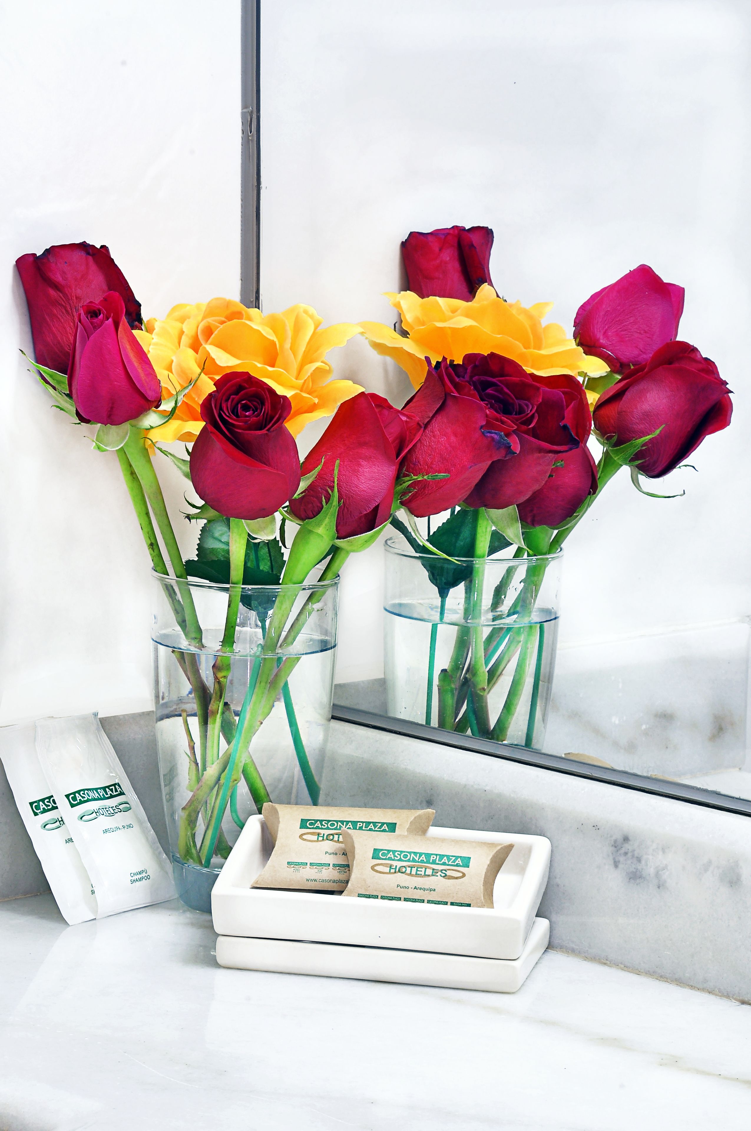 combined shower/bathtub, designer toiletries, hair dryer, towels