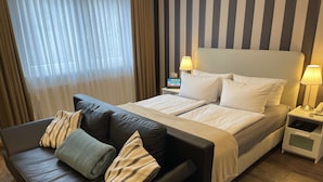 Habitación Premium | Ropa de cama de alta calidad, cortinas opacas, sistema de insonorización