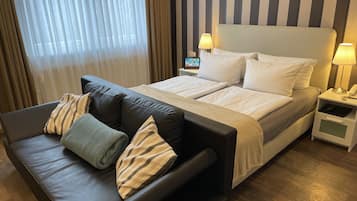 Premium kamer | Luxe beddengoed, verduisterende gordijnen, geluiddichte muren