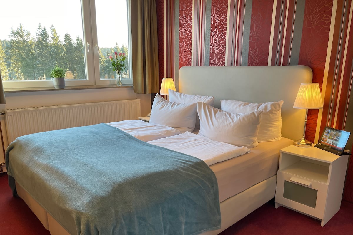 Suite Premium | Ropa de cama de alta calidad, cortinas opacas, sistema de insonorización