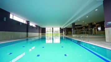 Indoor pool, open 6:00 AM to 10:00 PM, lifeguards on site