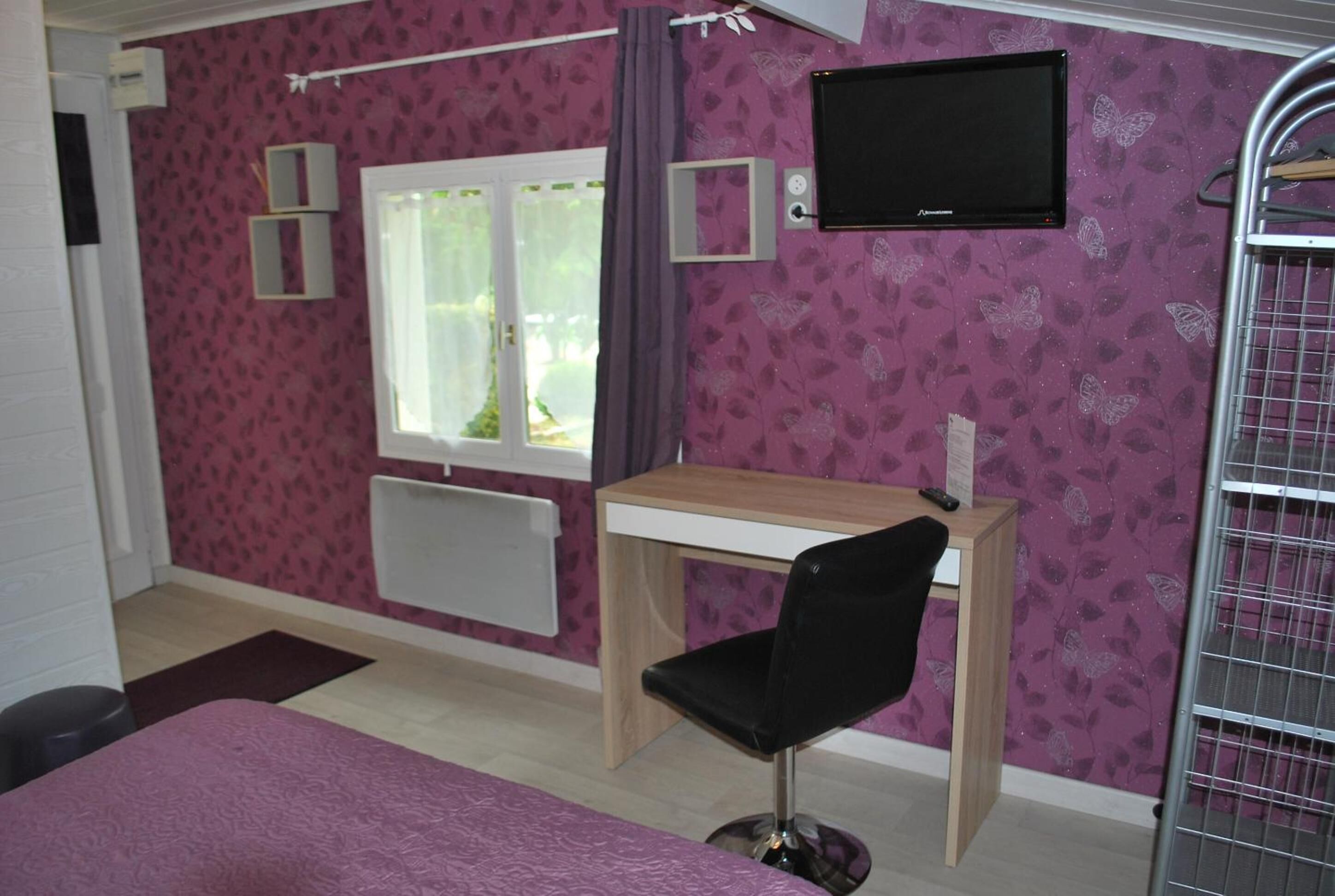 individually decorated, desk, blackout curtains, iron/ironing board