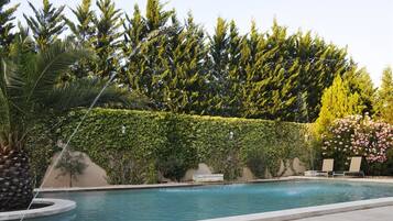 Seasonal outdoor pool, pool umbrellas, sun loungers