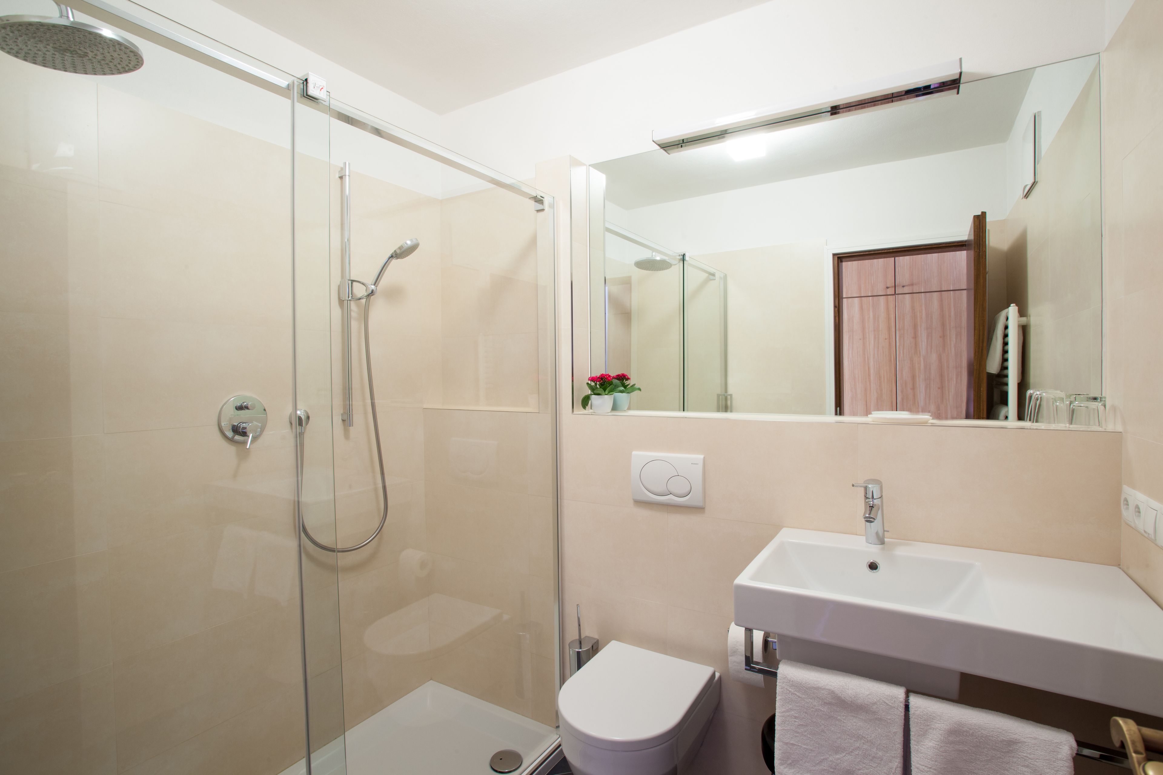 double room | bathroom | shower, rainfall showerhead, hair dryer, towels