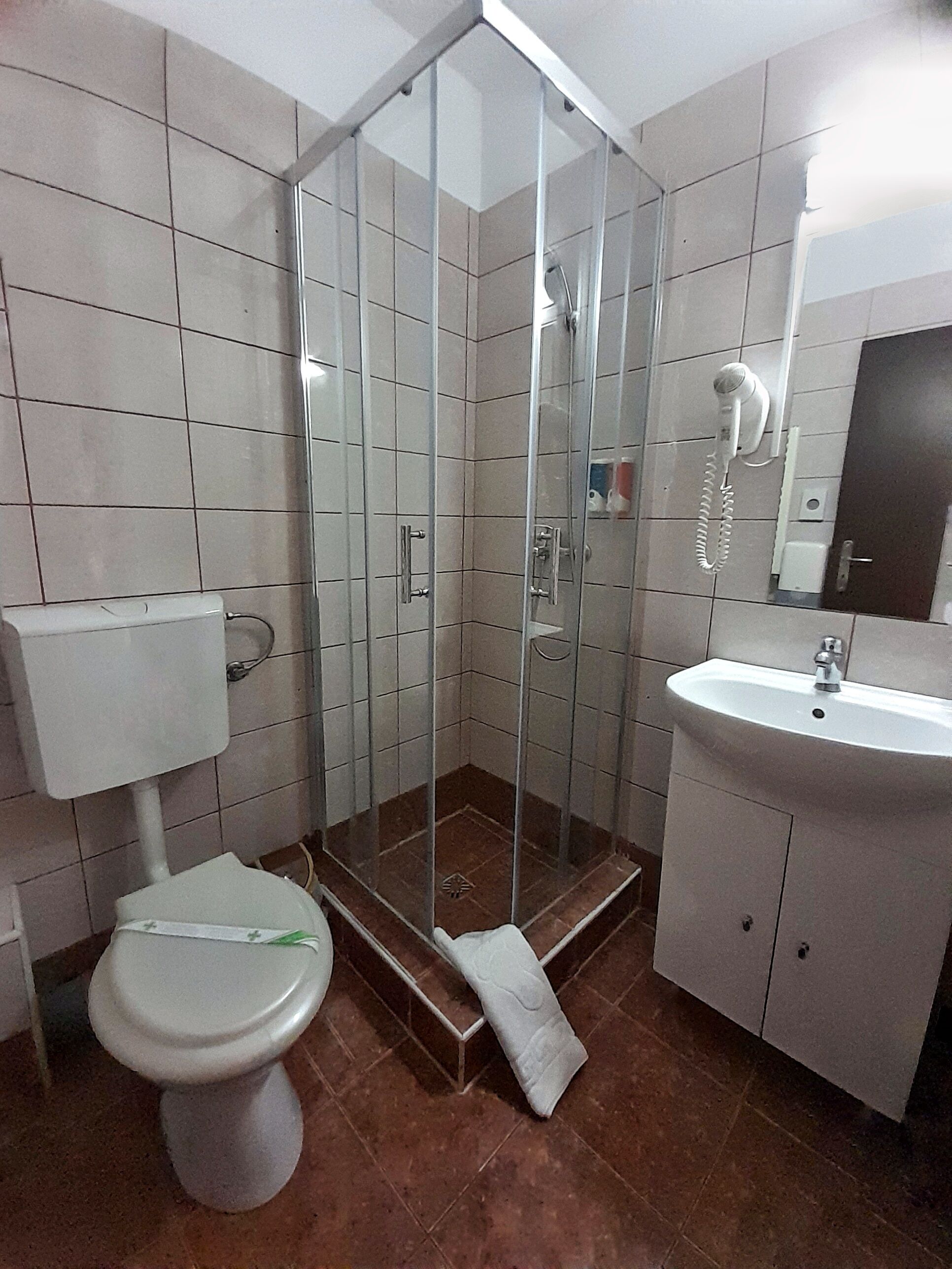 shower, designer toiletries, hair dryer, towels