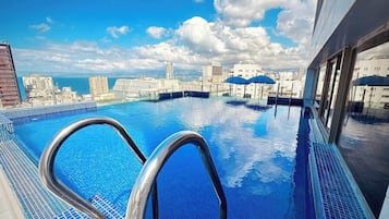 Outdoor pool, sun loungers