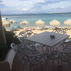 Breakfast, lunch, dinner served; beach views
