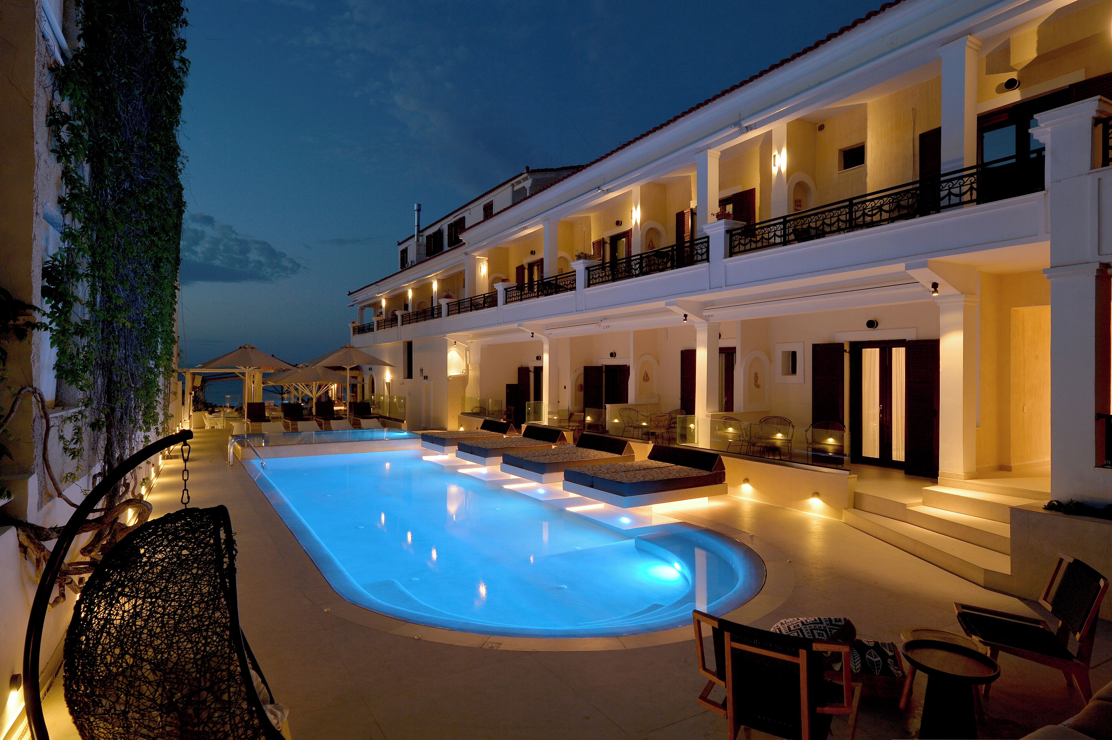 Seasonal outdoor pool, open 10:30 AM to 8:30 PM, pool umbrellas