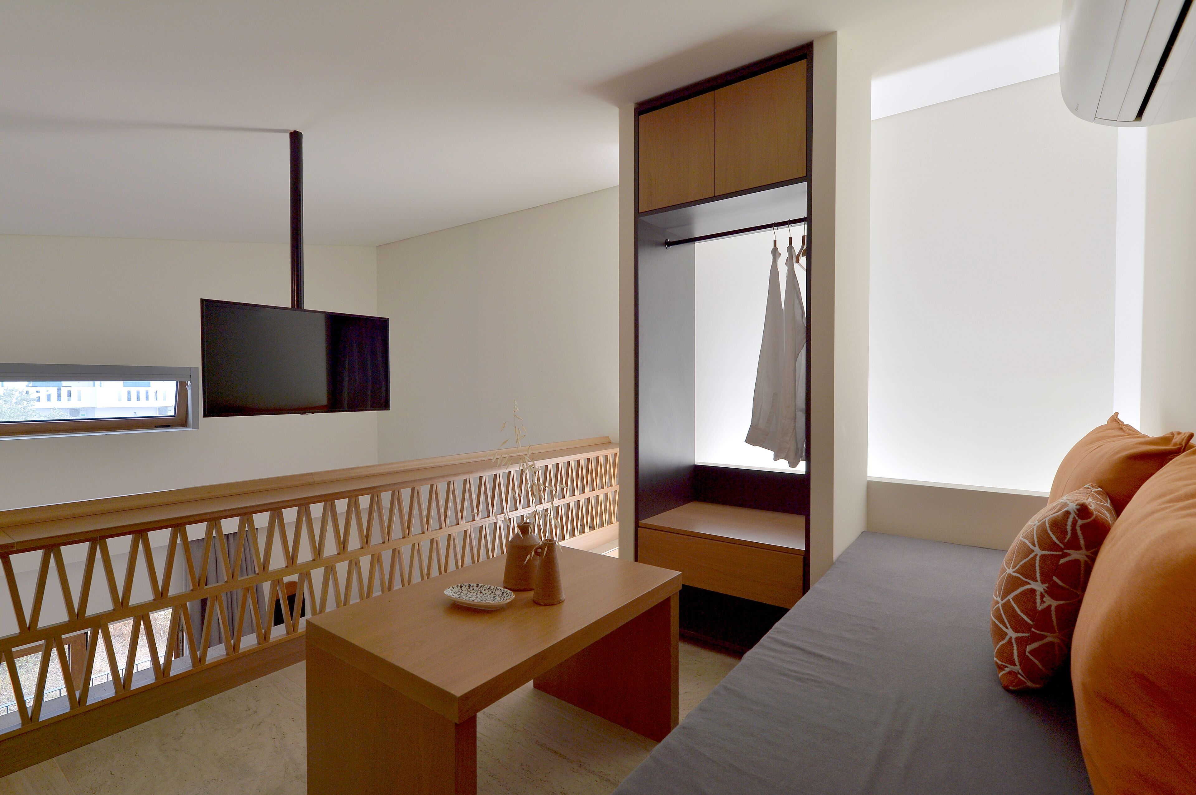 grand suite, hot tub | living area | lcd tv