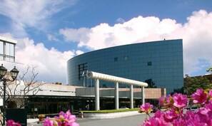 Stunning curved architecture with a sleek, cylindrical extension.