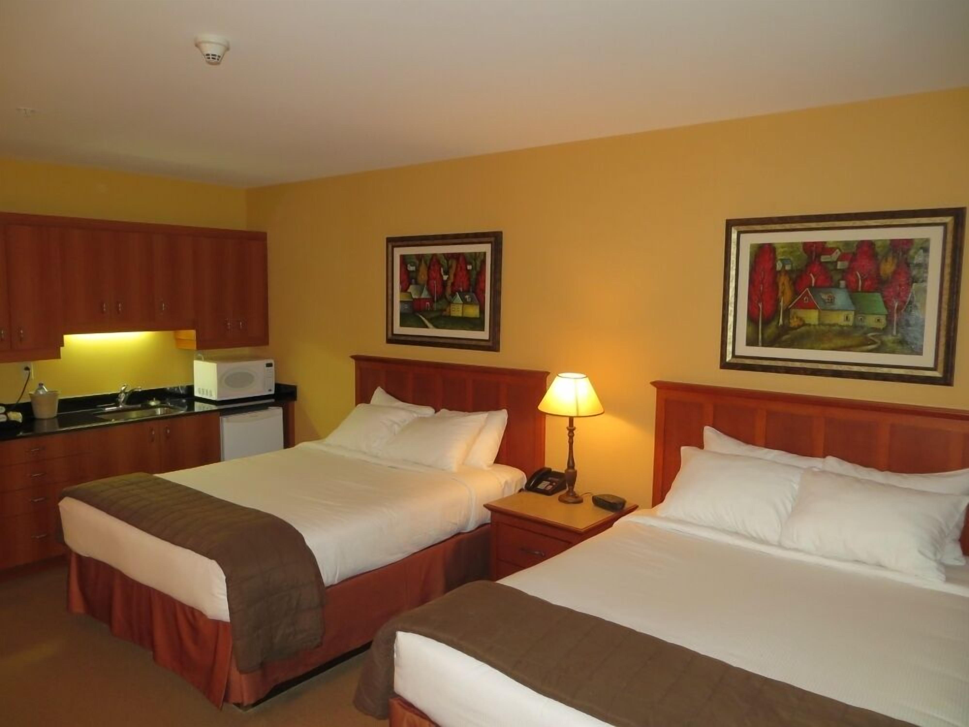 Suite Standard, 2 letti queen, angolo cottura