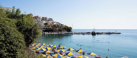 Private beach, sun loungers, beach umbrellas, beach towels