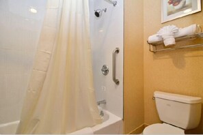 Combined shower/tub, rainfall showerhead, free toiletries, hair dryer