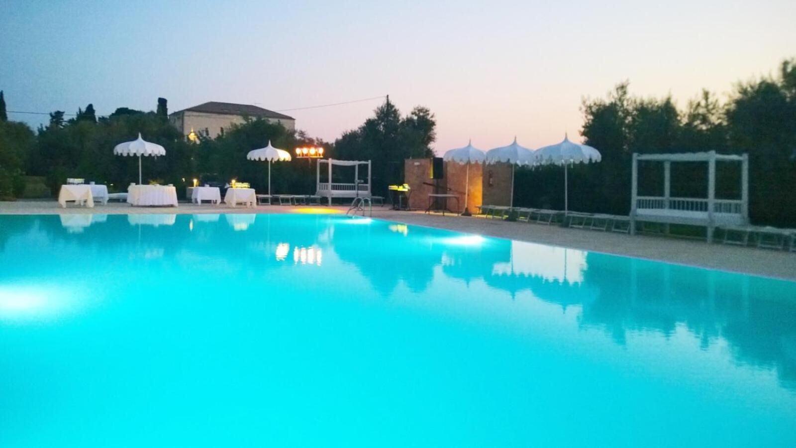 seasonal outdoor pool, pool umbrellas, pool loungers