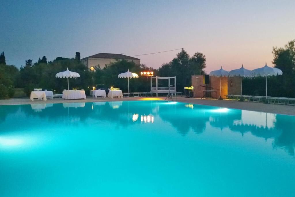 seasonal outdoor pool, pool umbrellas, pool loungers