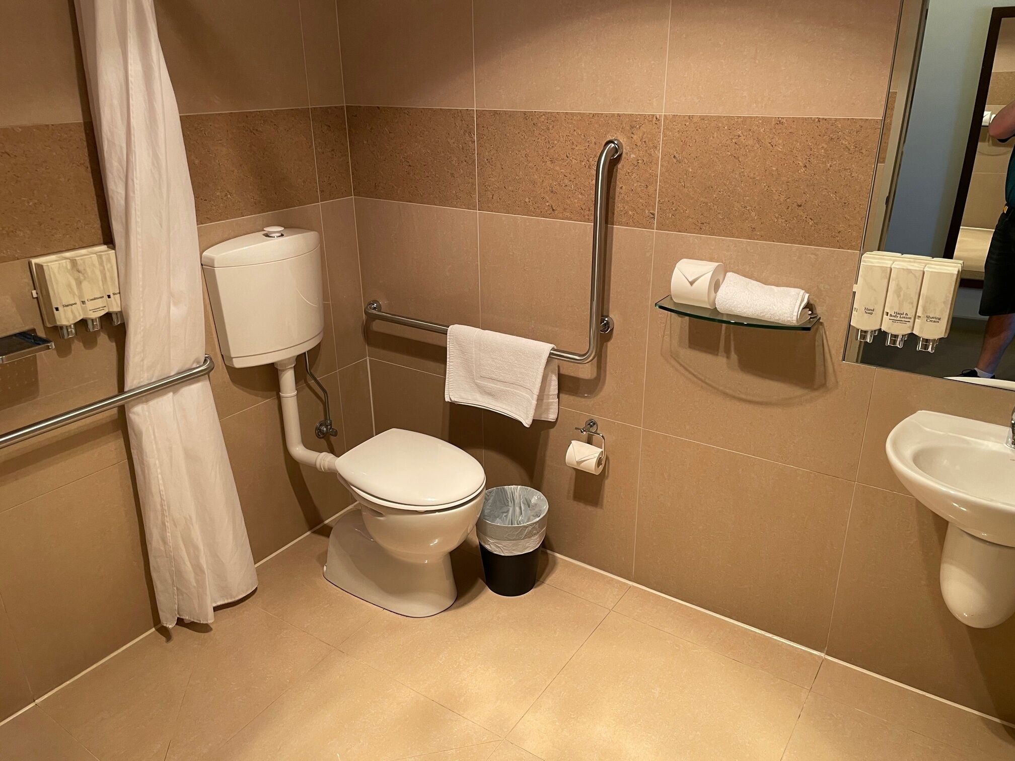 deluxe queen suite | bathroom | hair dryer, towels