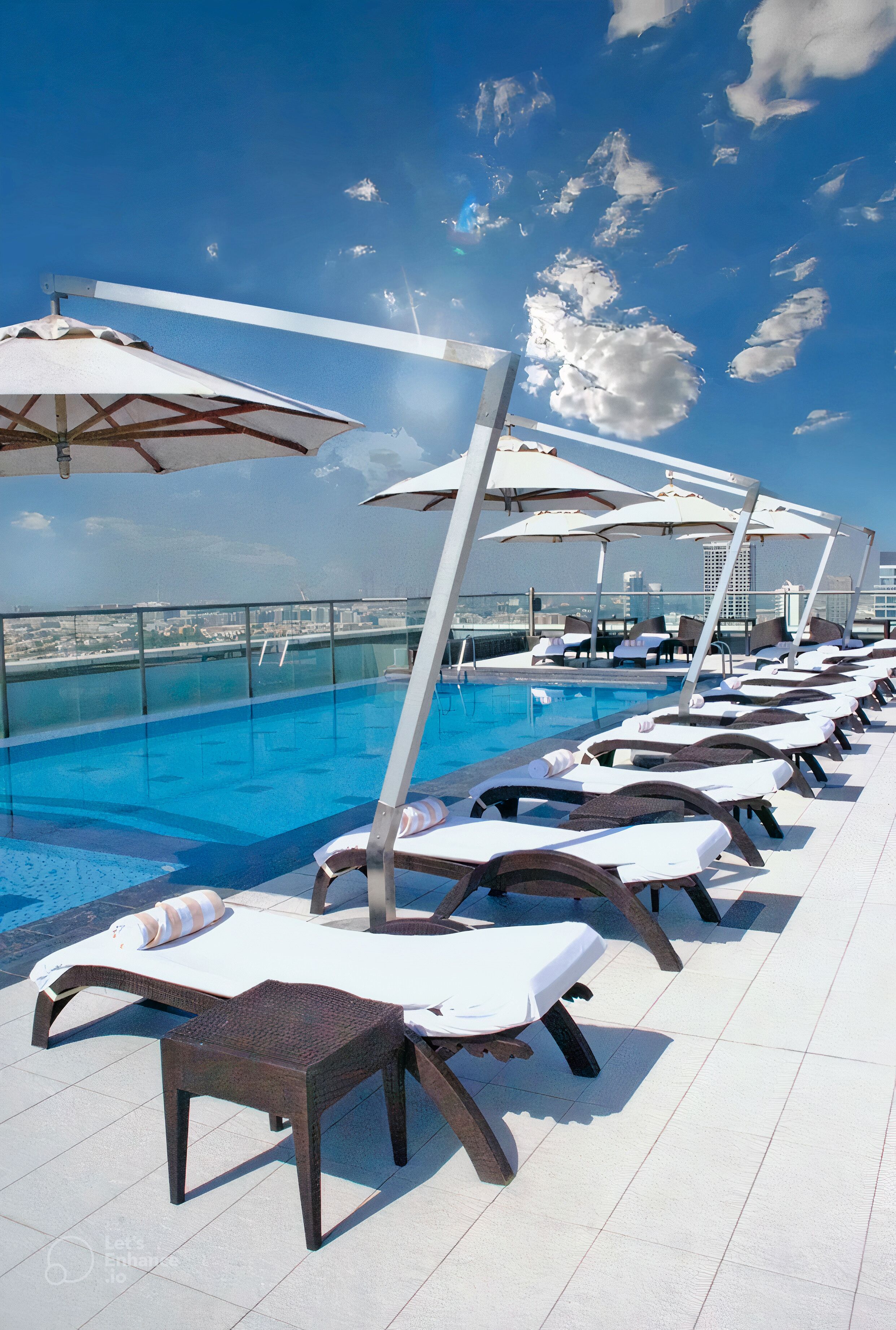 Outdoor pool, pool umbrellas, pool loungers