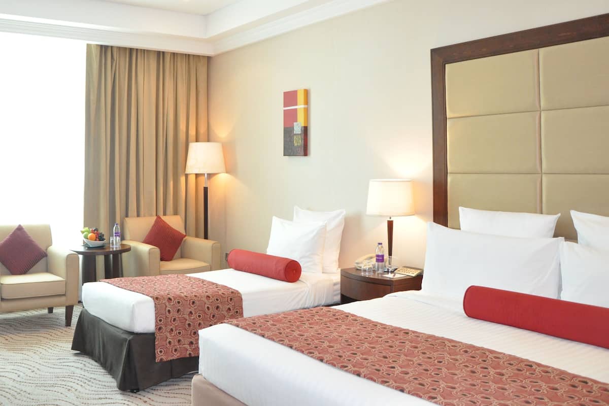 Deluxe Triple Room | Premium bedding, in-room safe, desk, blackout drapes