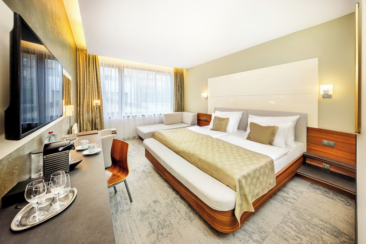 superior double room with extra bed | minibar, in-room safe, desk, blackout curtains