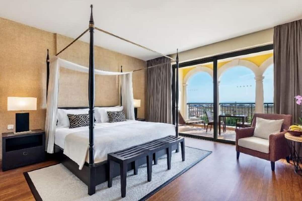 Hypo-allergenic bedding, down duvets, in-room safe