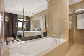 Suite, Sea View | Bathroom | Separate tub and shower, deep soaking tub, rainfall showerhead