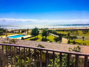 On the beach, sun-loungers, beach umbrellas, beach towels