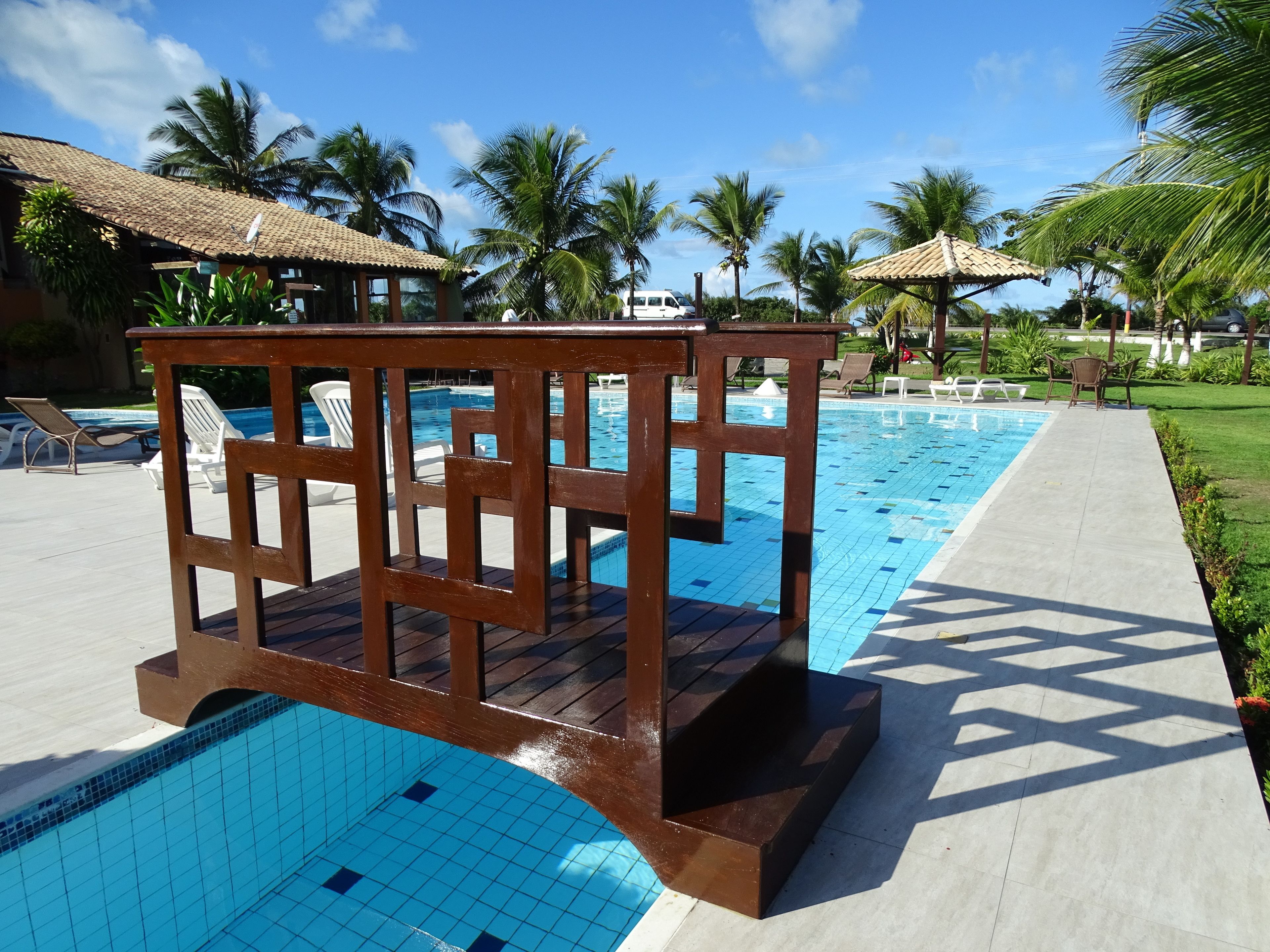 outdoor pool, pool umbrellas, pool loungers
