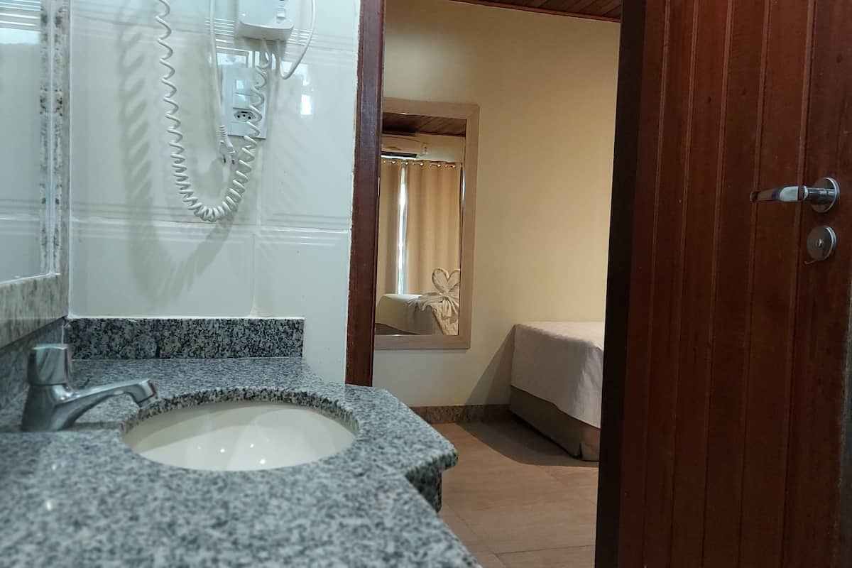 standard room | bathroom | shower, hair dryer, towels