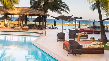 Outdoor pool, pool umbrellas, sun loungers