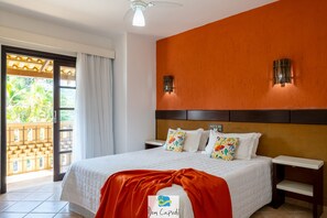 Habitación superior | Minibar, cortinas blackout, wifi gratis y ropa de cama 